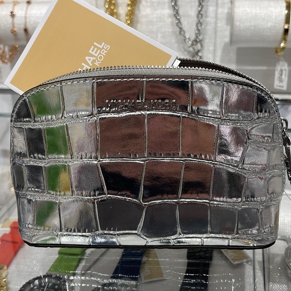 Michael Kors Empire Sm Metallic Crocodile Embossed Leather Travel Pouch
Silver - Picture 12 of 16